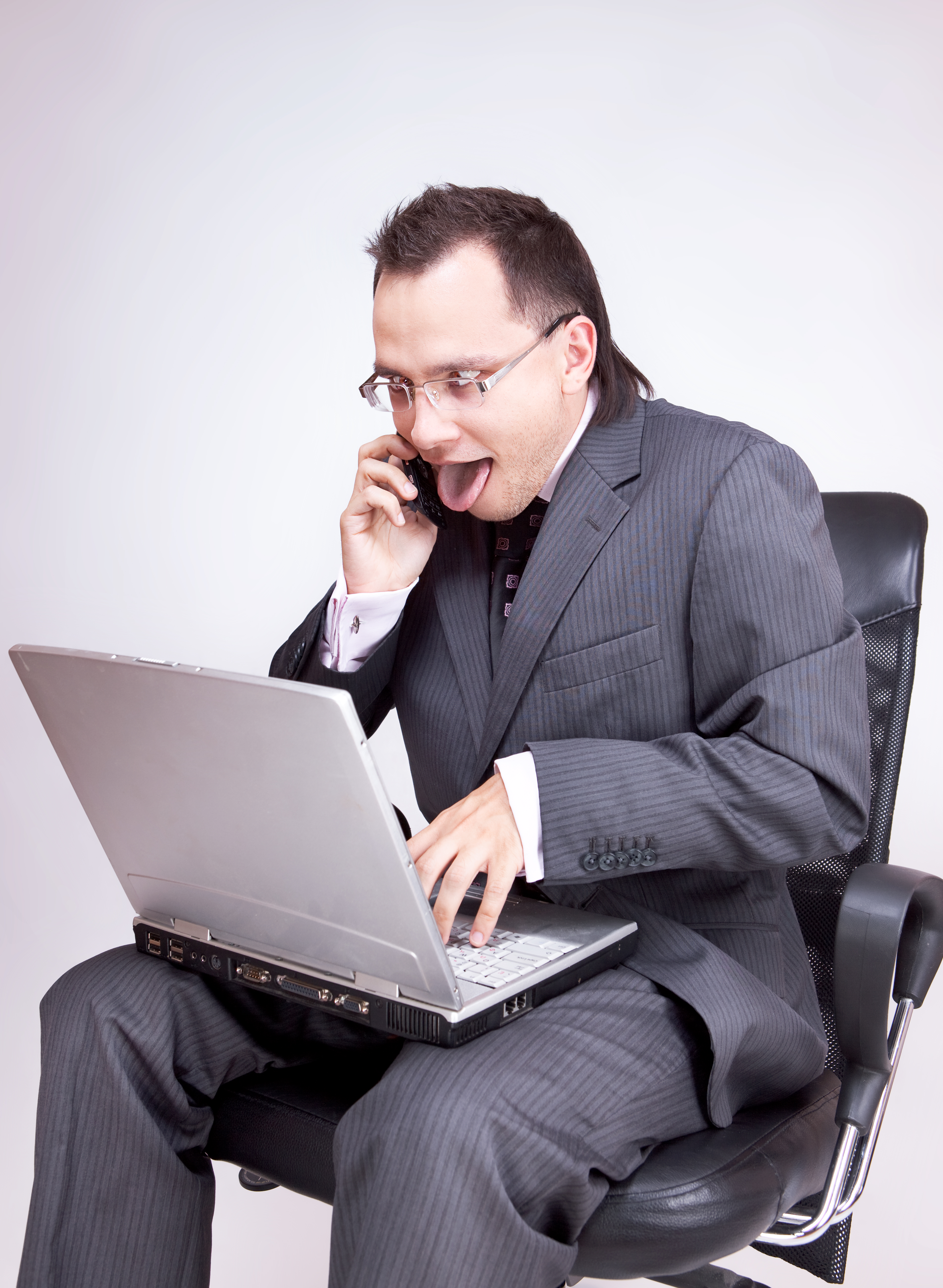Businessman sitting and using laptop